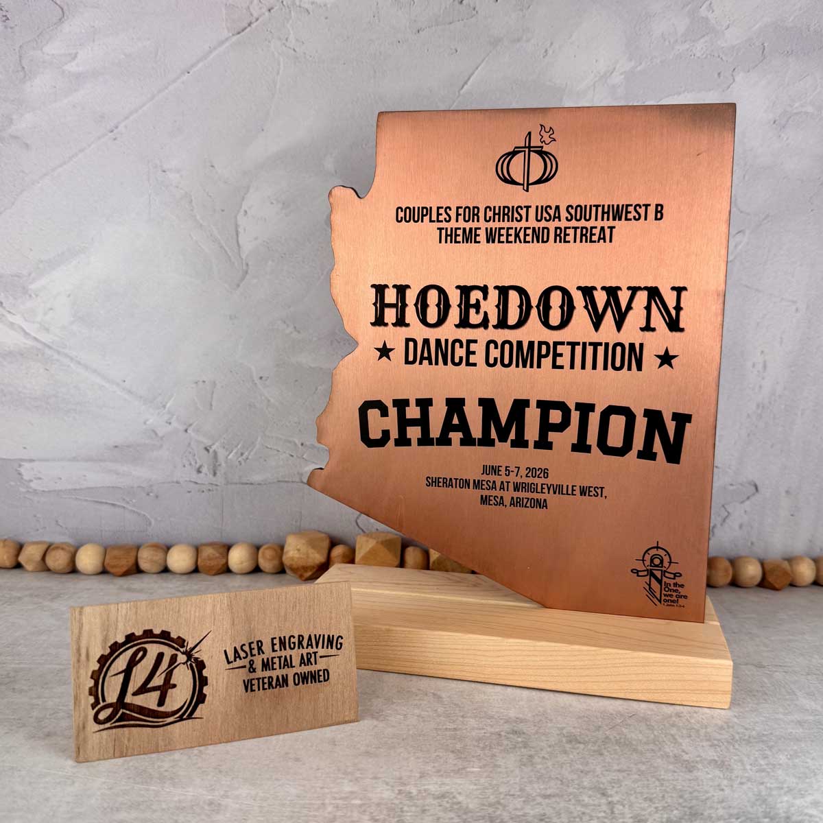 Copper award made from metal in the shape of Arizona, has wood base for standing. UV Printed award. 