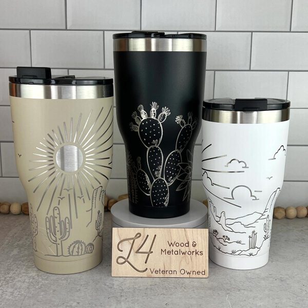 three engraved Rtic tumblers, in 20 oz and 30 oz sizes.