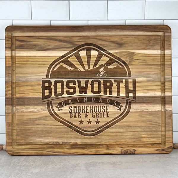 engraved cutting board with Bosworth name and family logo engraved