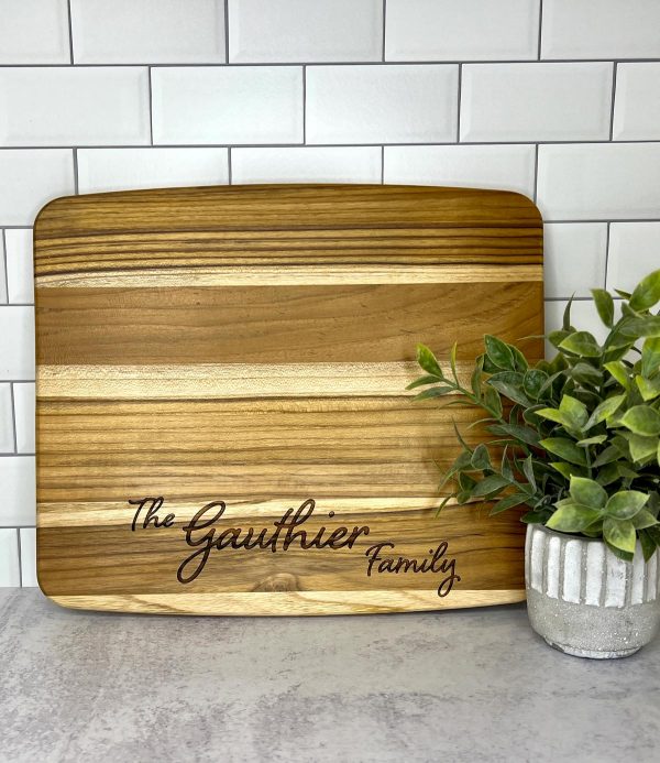 acacia cutting board engraved with The Gauthier Family
