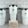 white Rtic 30 oz cups engraved with MC logo for MC Companies.