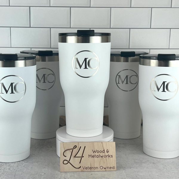 white Rtic 30 oz cups engraved with MC logo for MC Companies.