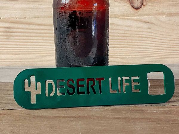 desert life bottle opener against a beer bottle