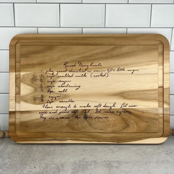 wood cutting board laser engraved with a handwritten recipe