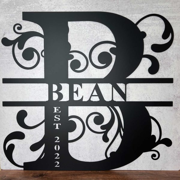 black metal monogram that says "Bean" and Est. 2022.