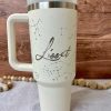 cream stanley tumbler with constellations and name Lisset