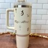 cream tumbler with peloton bikes and leaderboard name