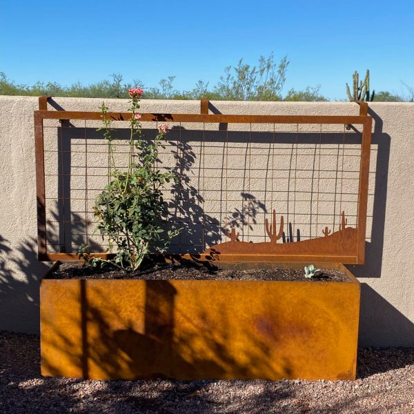 large rusted metal planter box with trellis attached. Trellis hangs over the wall instead of being mounted to the wall.