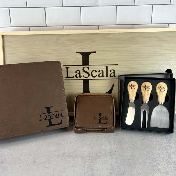 Custom engraved BBQ tool set, wine tool set, vegan leather coasters, and engraved charcuterie utensils.