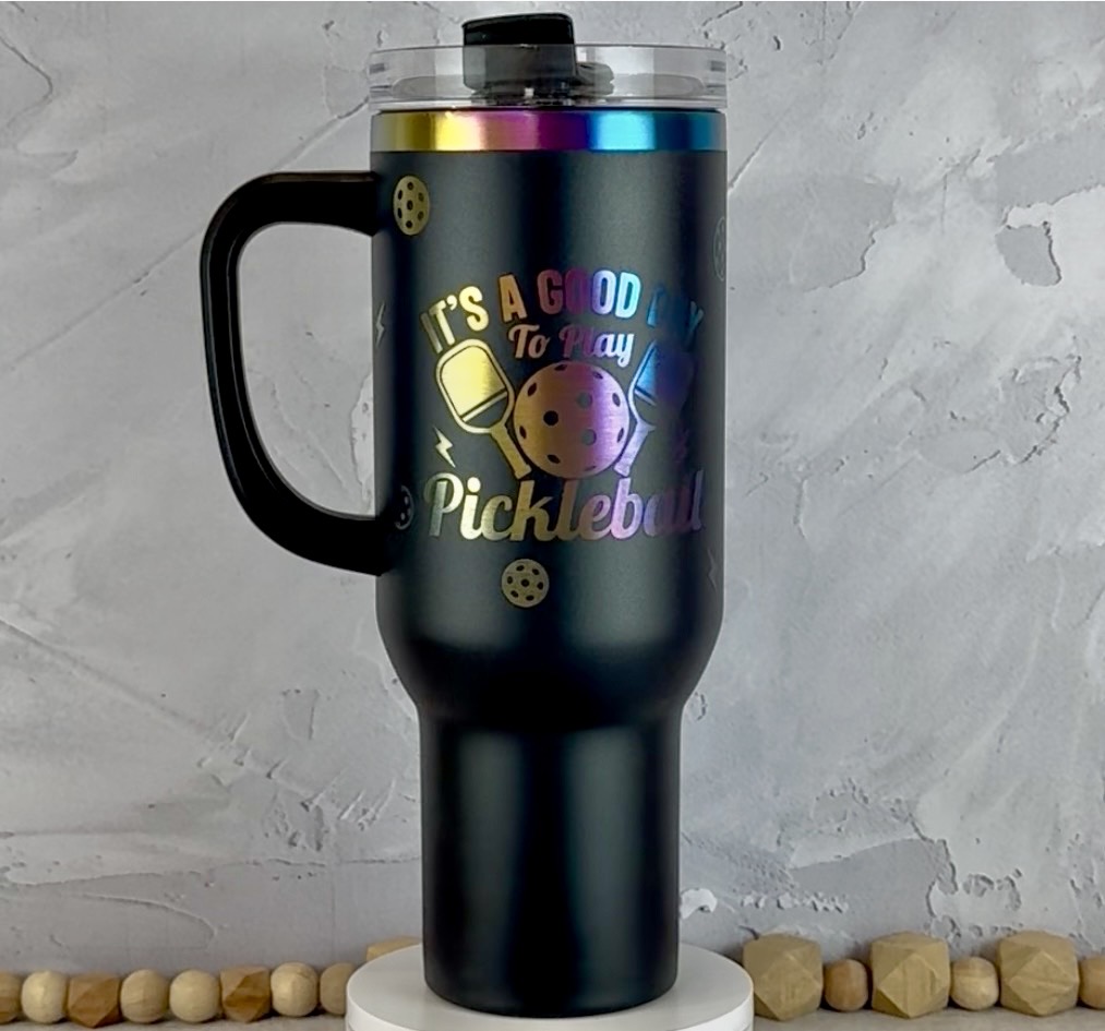 Black and Rainbow 40 oz Tumbler with Side Handle, engraved with pickleball saying and icons.