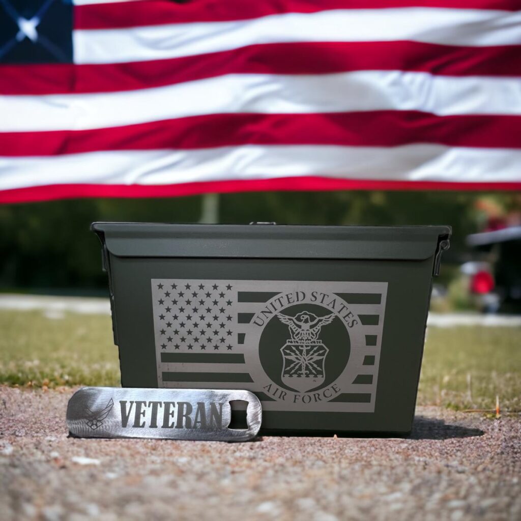 American flag in the background and engraved ammo can with air force logo in front.