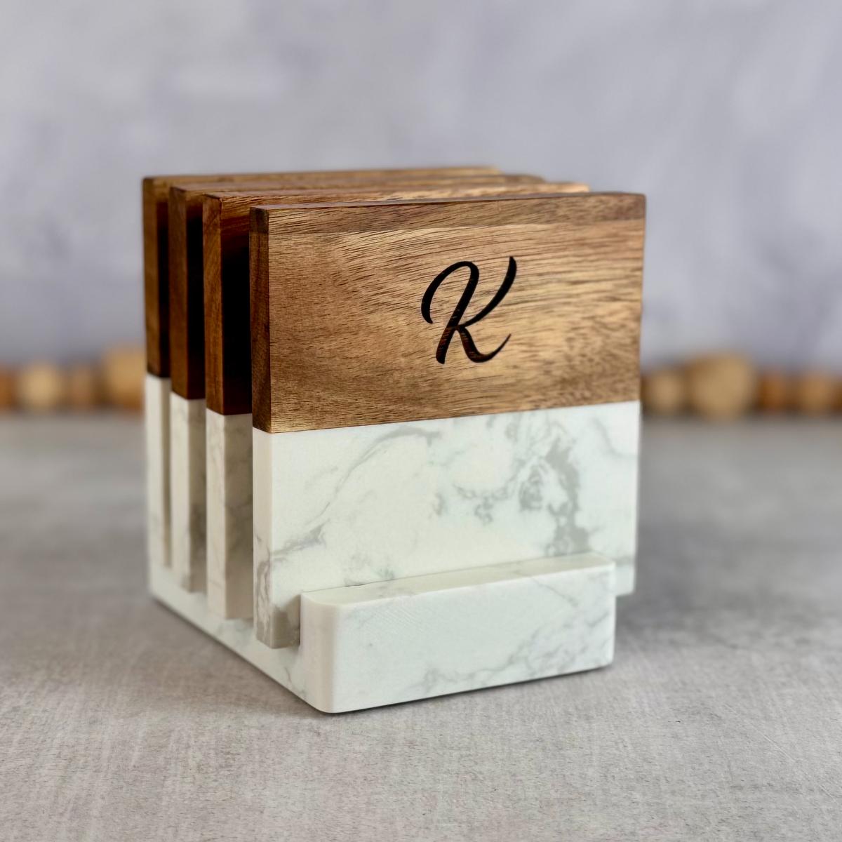 Engraved coaster set with marble base and wood accent for wedding gift.