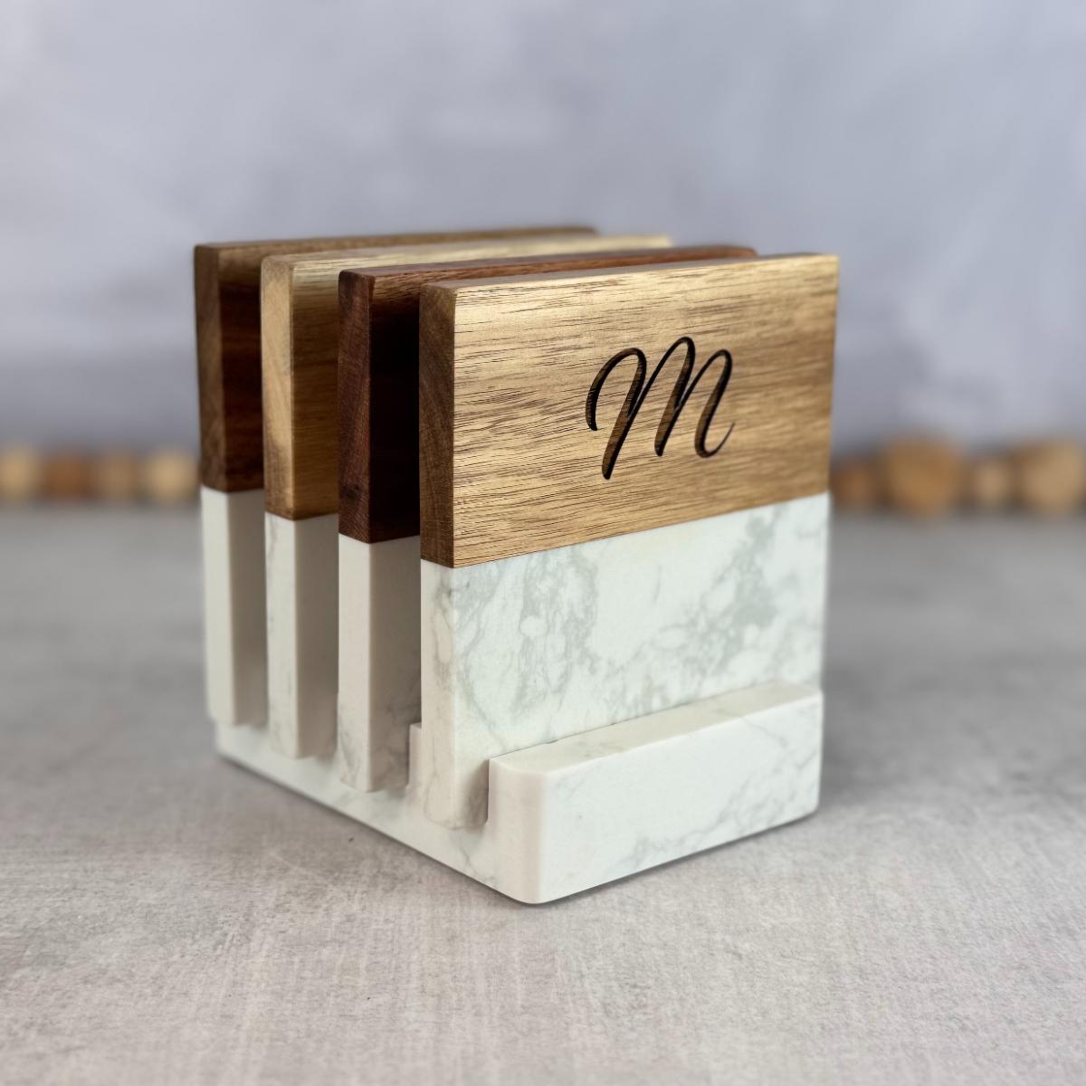 Marble and wood coaster set personalized with initials for modern kitchen.